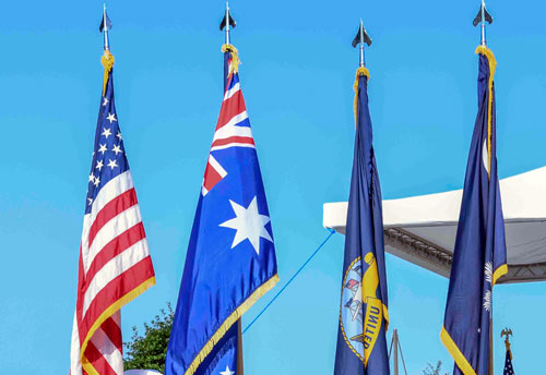 U.S. and Austrlian flags at ceremony